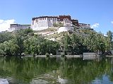 Tibet Lhasa 03 04 Potala From Behind, Above the Dragon King Pool The time on our entrance ticket wasn�t for over an hour, so we walked the Potala kora, with a spectacular view of the Potala Palace from behind, above the Dragon King Pool.